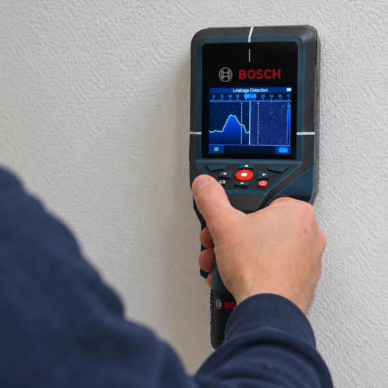 Technician using an acoustic listening device to find a hidden water leak in a Perris home