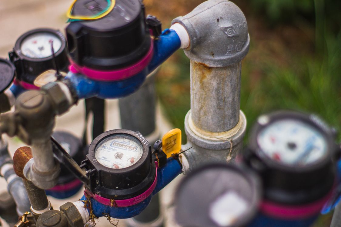 Close-up of a residential water meter used for a DIY leak test